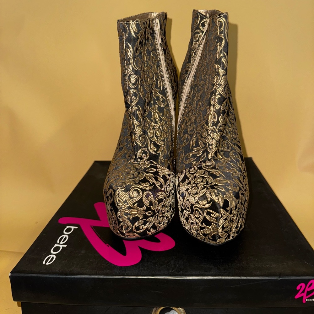 Bebe Black and Gold Heeled Boots with Intricate Design
